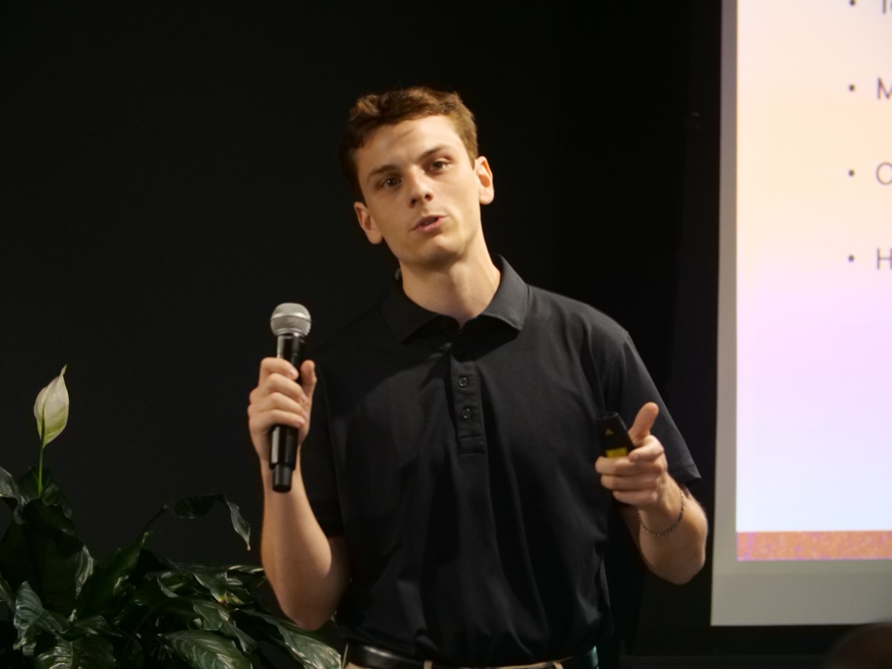 Weiss presenting during Venture Lab Demo Day at 1819