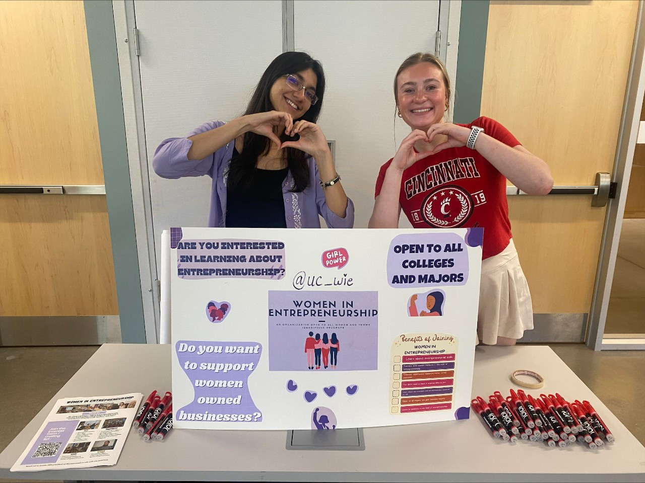 Wares, on the right, leading the UC Women in Entrepreneurship club